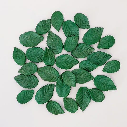 Thirty dark green leaves. Edible fondant icing cake decorations / topper.