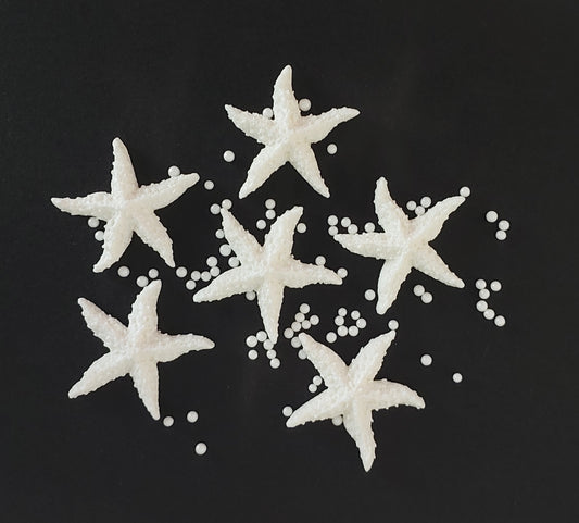six white starfish, edible fondant icing cake decorations with sugar pearls