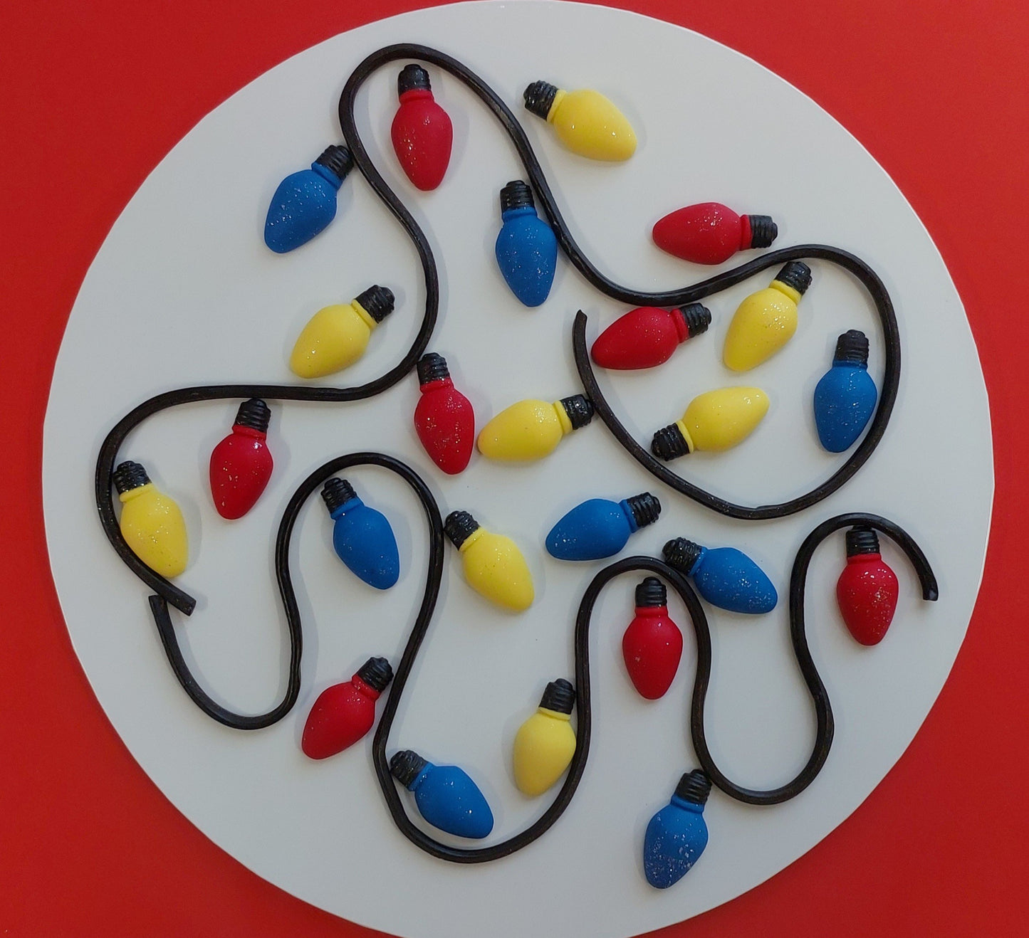 24 x Colourfull light bulbs and string, edible fondant icing and liquorice Christmas cake topper / decorations.
