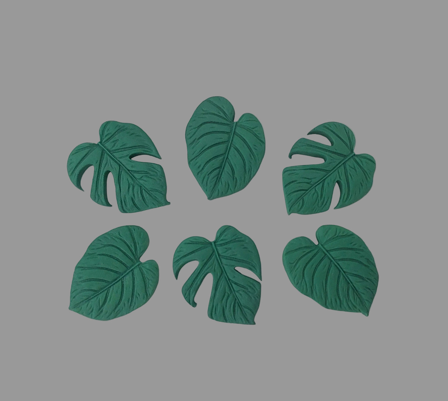 set of six tropical monstera leaves, edible fondant icing cake decorations