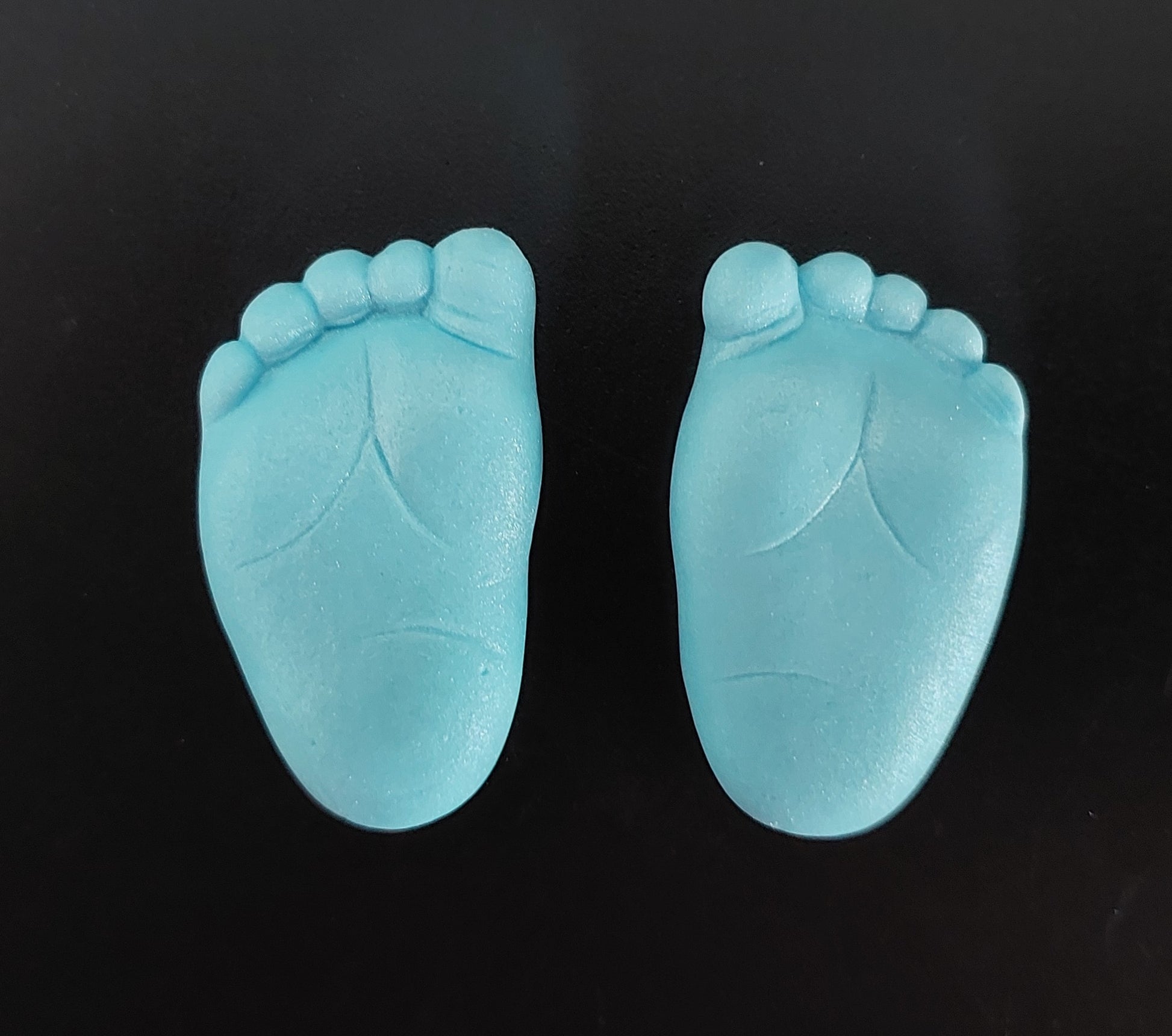 Blue baby feet, edible fondant cake decorations