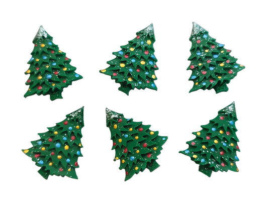 Set of six green Christmas tree-shaped edible cake decorations with colorful lights on a white background