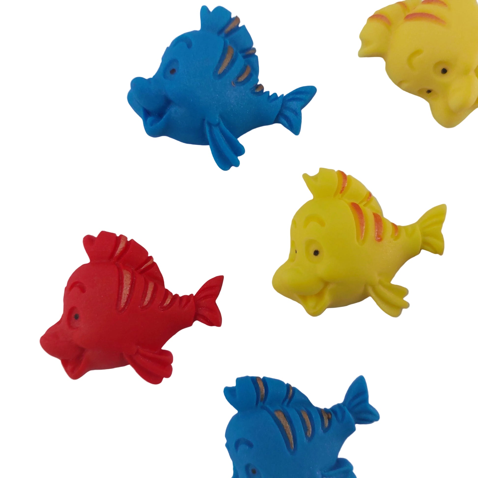 A set of six edible fondant fish. Cute decorations for an ocean themed cake.