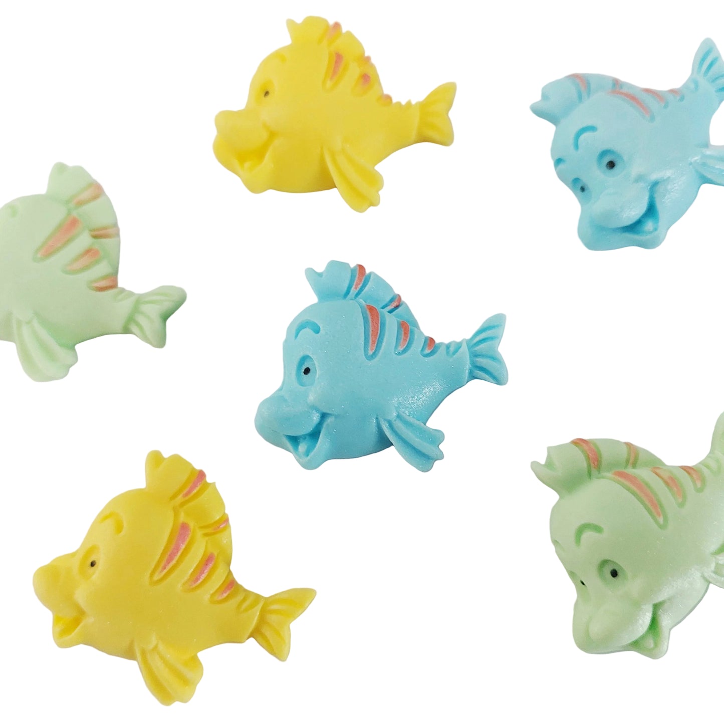 A set of six edible fondant fish. Cute decorations for an ocean themed cake.