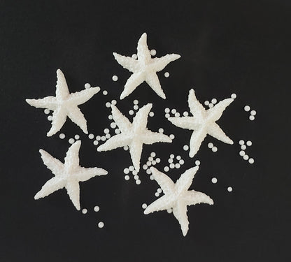 six white starfish, edible fondant icing cake decorations with sugar pearls